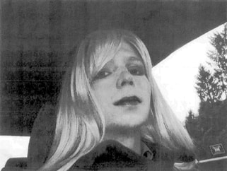 A black and white picture of Chelsea Manning. She has light-colored hair and light skin, and is sitting in a car.
